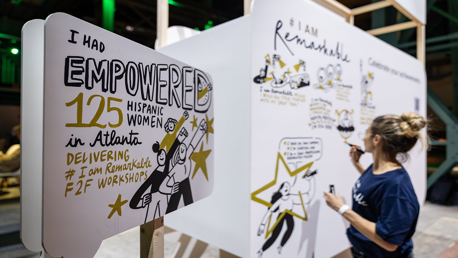 IamRemarkable Campaign with team member live scribing onto artwork wall