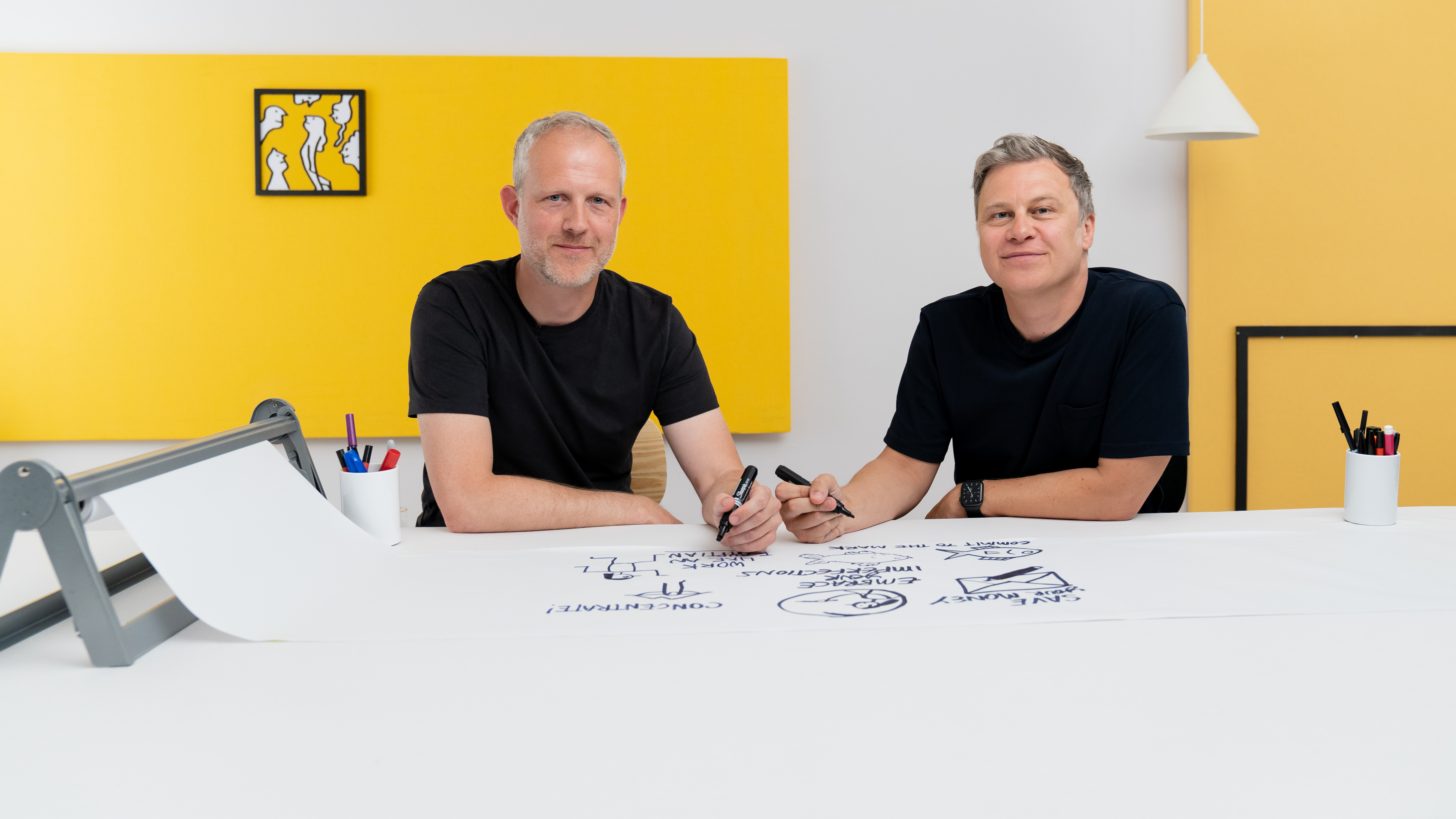 Scriberia founders Chris and Dan drawing a route to success